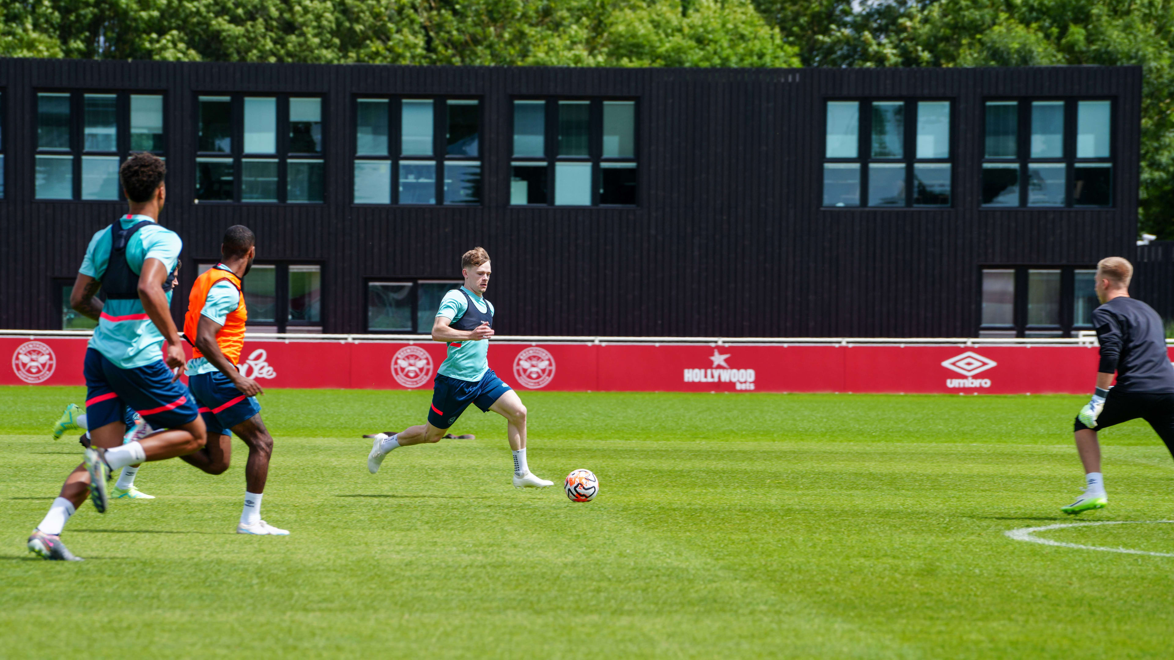 Clean through: Keane Lewis-Potter is faced up by goalkeeper Matt Cox